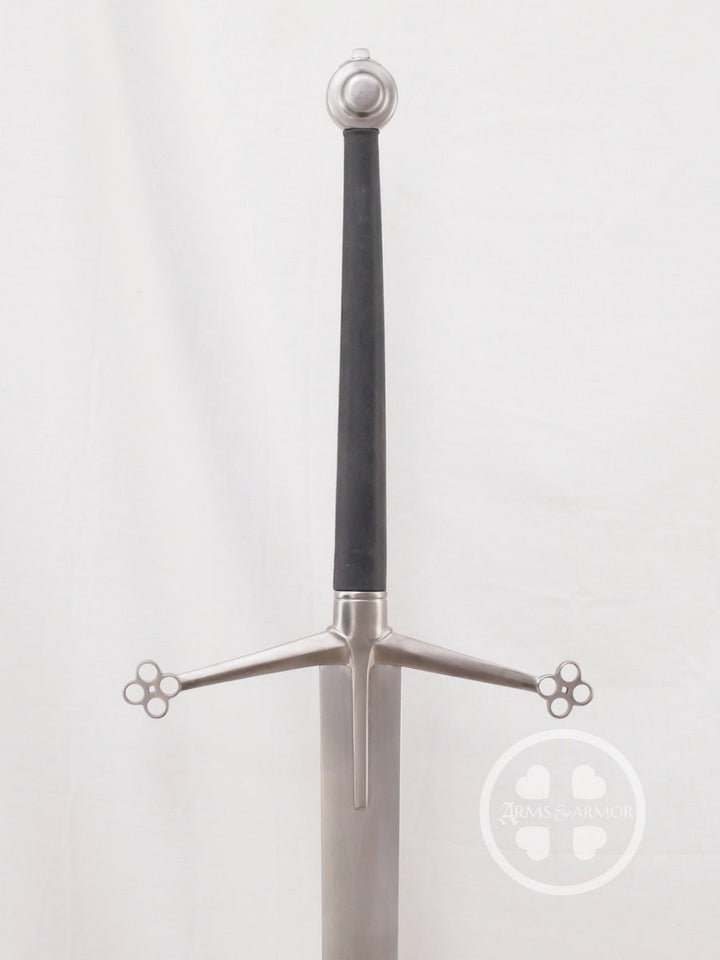 Scottish Claymore #100 hilt view with black grip and steel fittings.