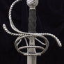 Writhen Rapier #151 three ring style of hilt all done in bars of writhed form withe the writhen detail carried through the grip and the pommel.