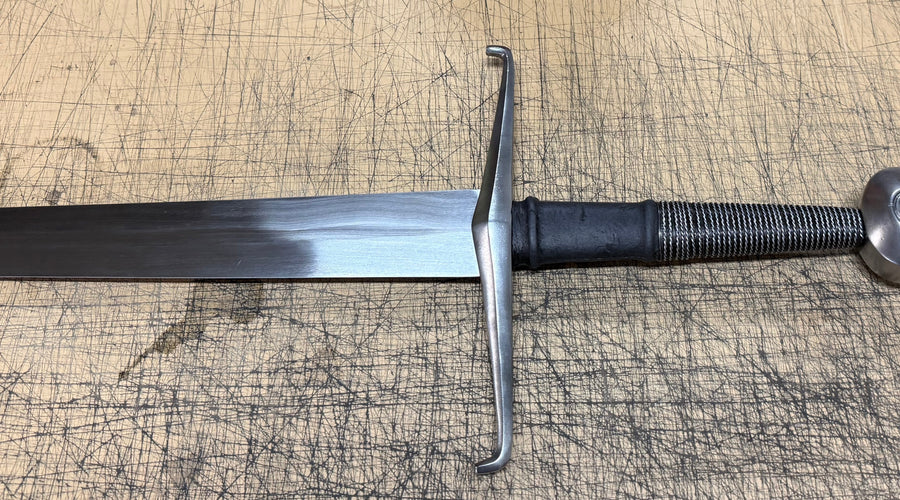 A Sword for Training Armored Combat