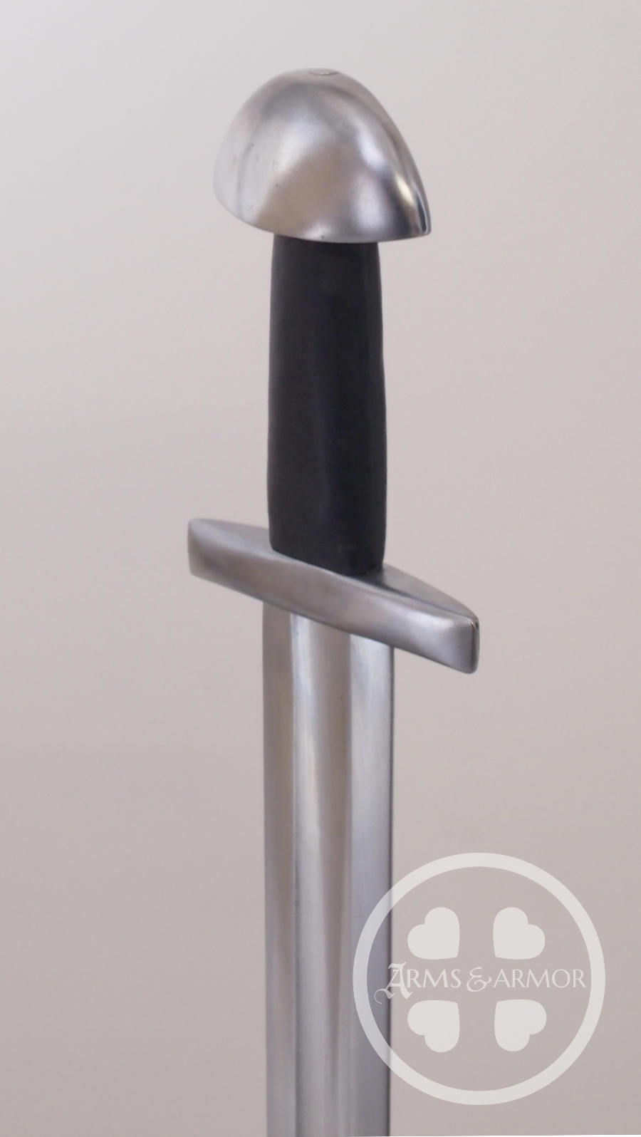 High angled quarter view of #252 Viking Training sword with black grip and peened hilt.