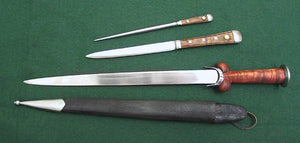 Wallace Ballock Dagger Set #199 four piece set with a large ballock style knife with a smaller by-knife, a pick and a scabbard that holds the other three items.
