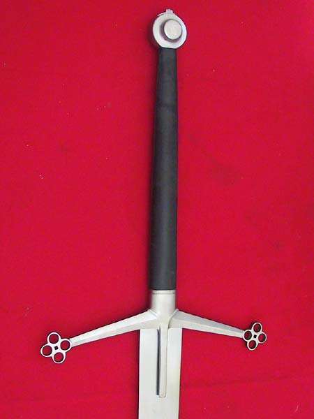 #100 Highland Claymore Sword Black Grip, wheel pommel and down sloping guard with quatrefoil terminals.