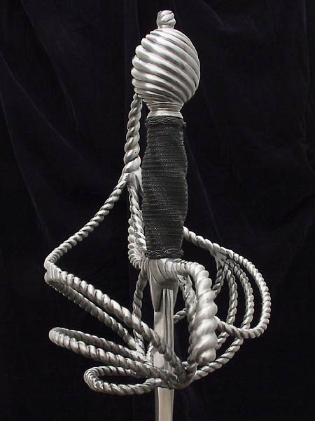 Writhen Rapier #151 the hilt done in bars of writhed form throughout and mounted on a diamond sectioned wide blade.